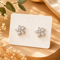 Boucles d’oreilles marguerite dorées – détail 3