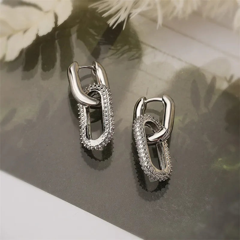Boucles d’oreilles dorées à maillons avec – détail 8